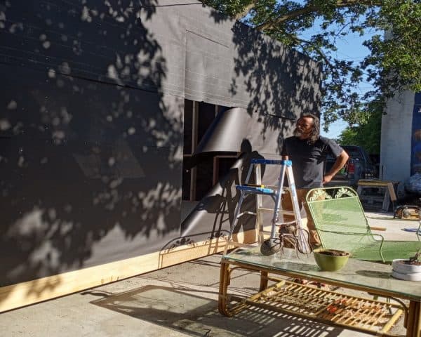Veterans building together at a construction site